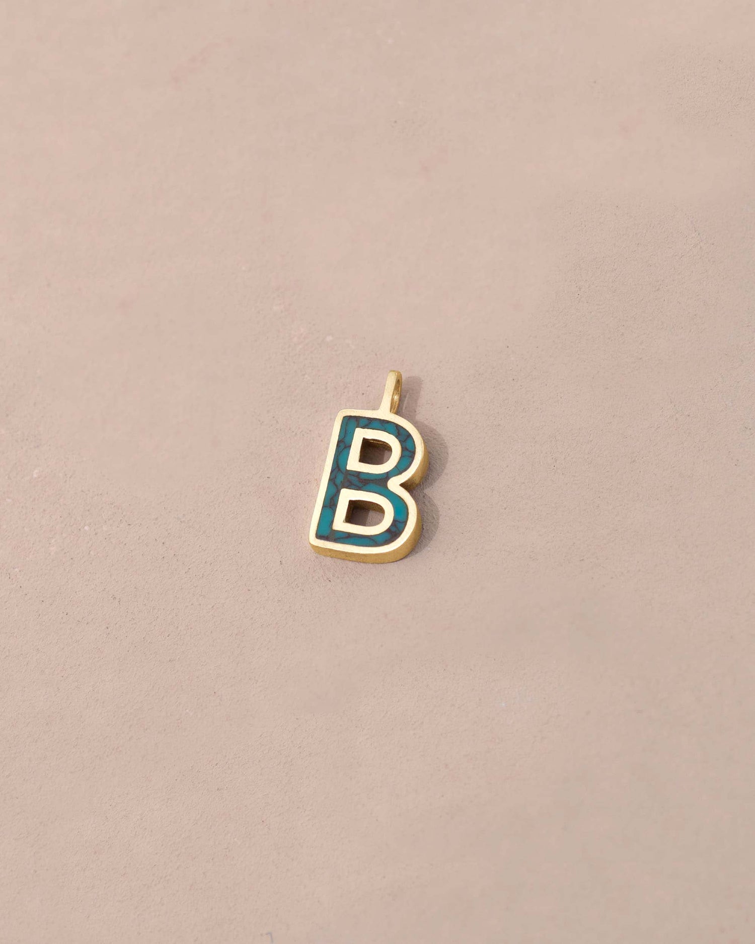 Gold and blue letter &
