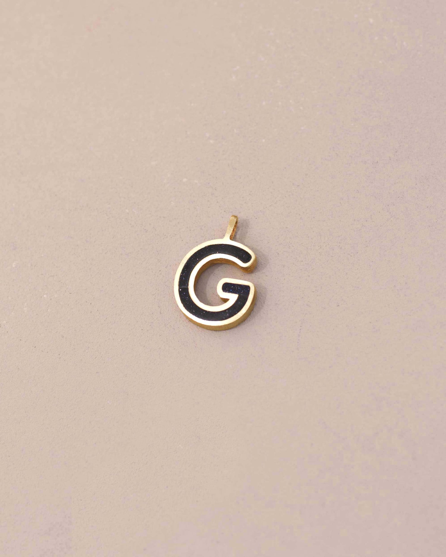 Gold and black letter &