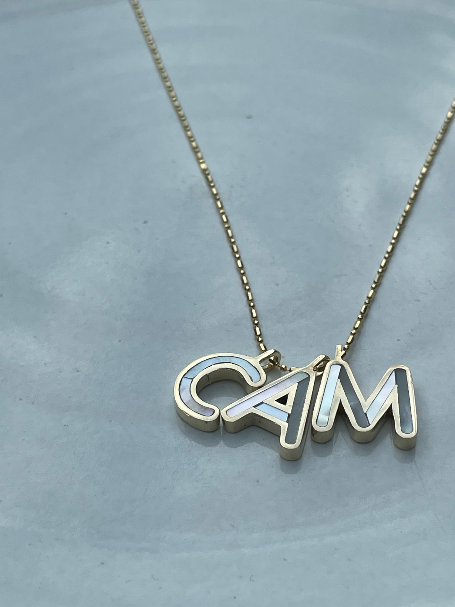 Necklace with &