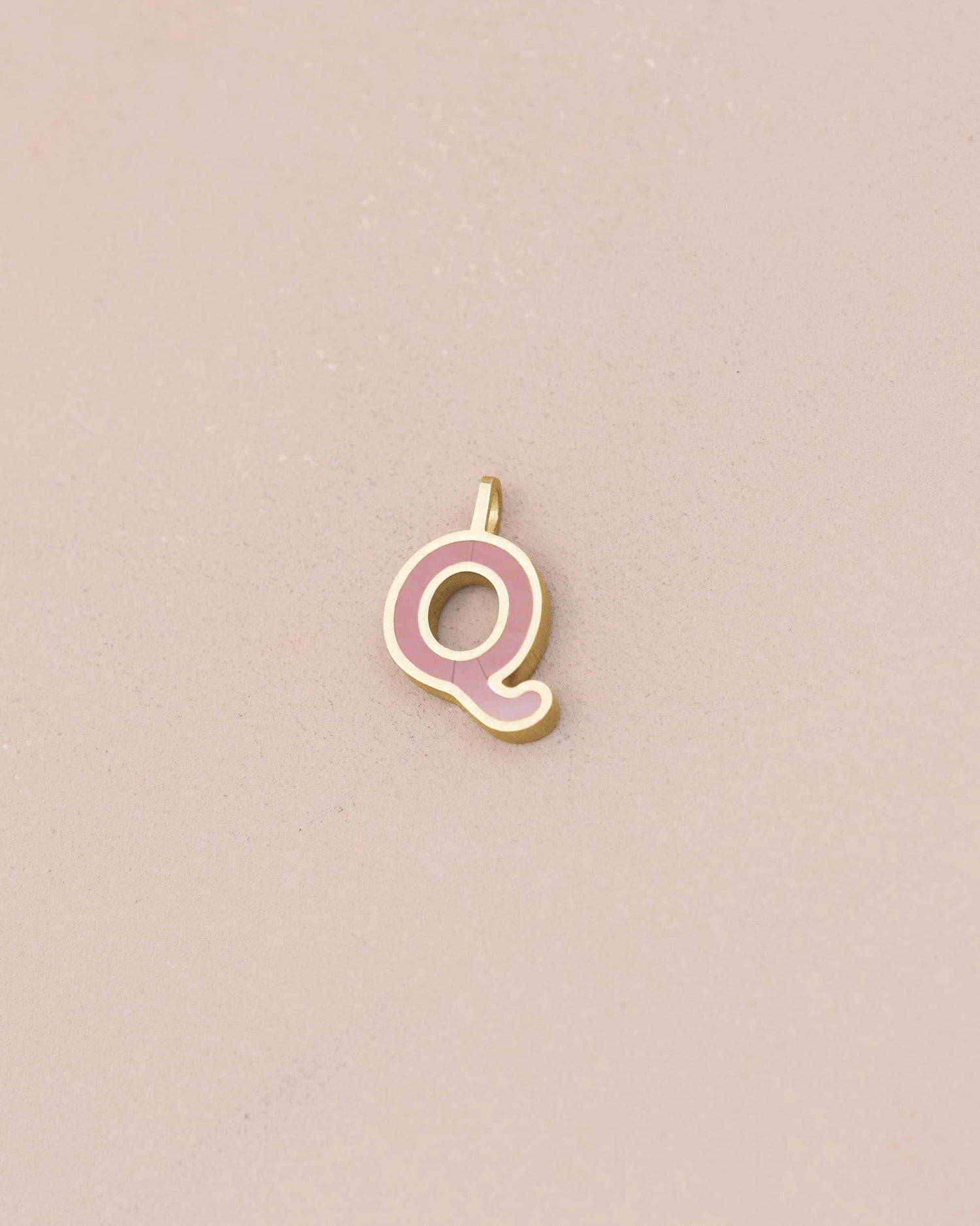 Gold and pink letter &