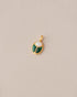 A gold charm featuring a scarab design with jelly opal and malachite inlays, displayed against a neutral background.