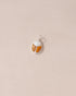 A silver charm featuring a scarab design with jelly opal and mookaite stones on a light background.