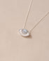 silver eye pendant inlaid with mother of pearl with silver chain