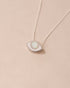 silver eye pendant inlaid with opal with silver chain