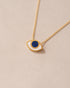 gold eye pendant inlaid with lapis lazuli with gold chain