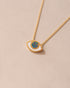 gold eye pendant inlaid with opal with gold chain