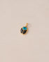 A 14K yellow gold charm in the shape of a scarab amulet with turquoise and onyx inlays, displayed against a neutral background.