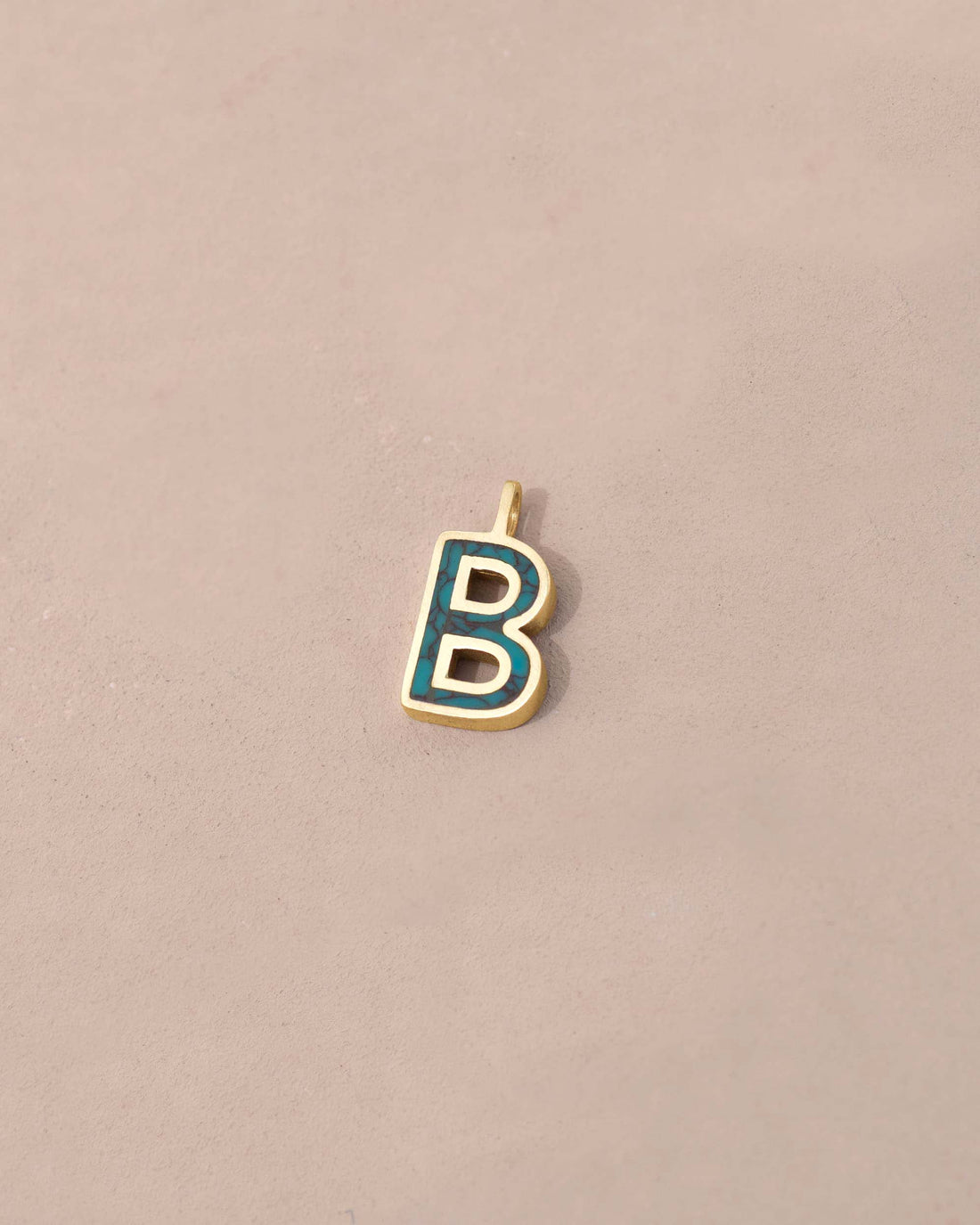 Gold and blue letter &