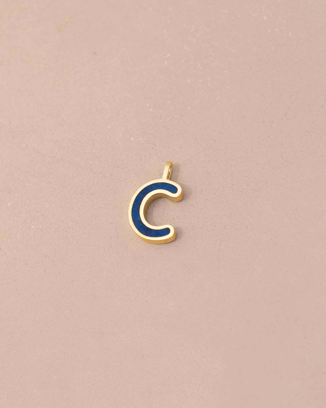 Gold and blue letter &