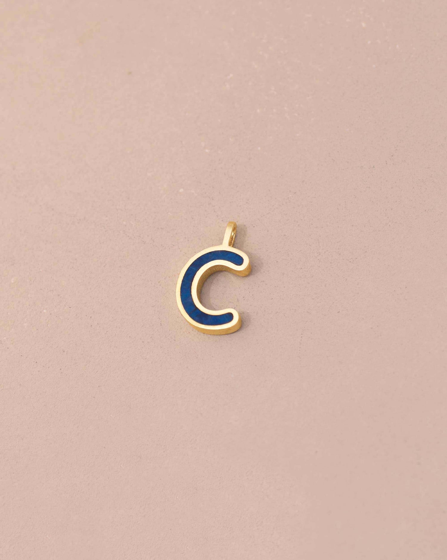 Gold and blue letter &