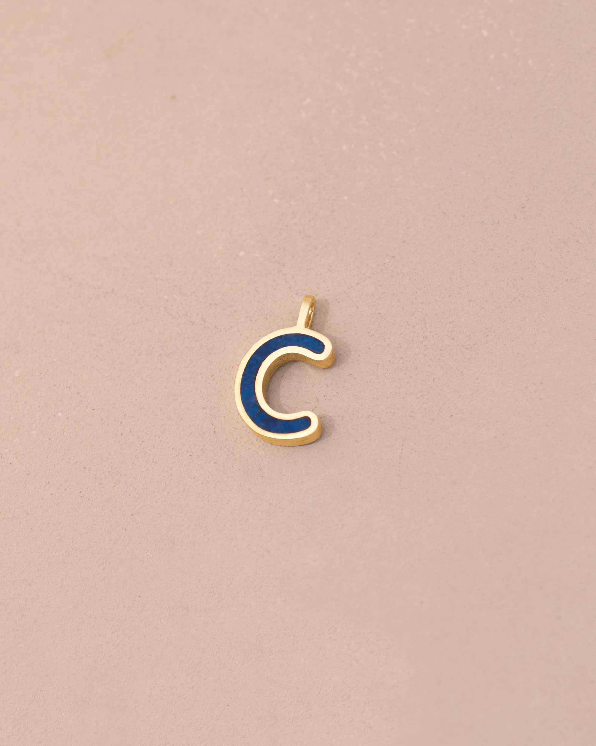 Gold and blue letter &