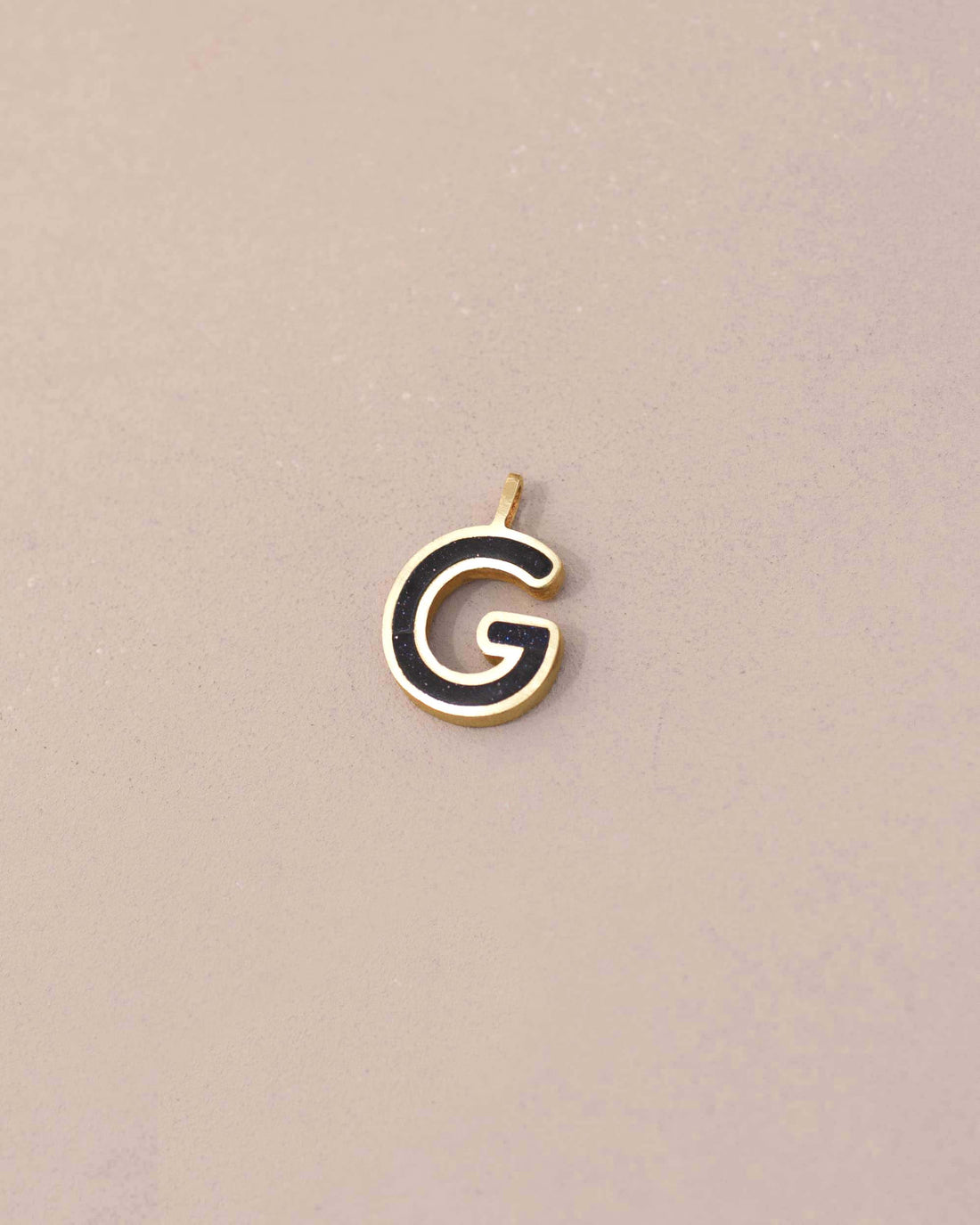 Gold and black letter &