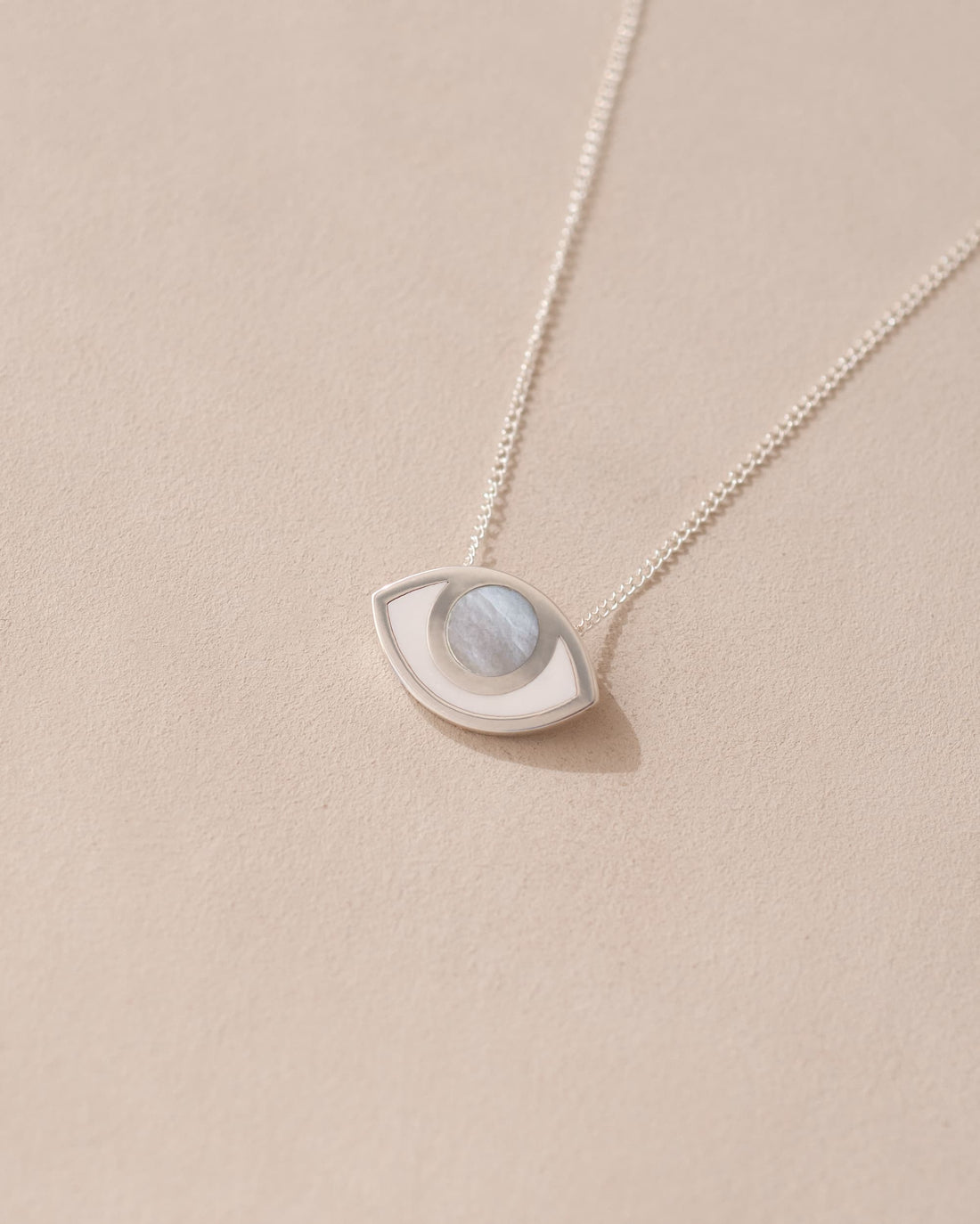 silver eye pendant inlaid with mother of pearl with silver chain