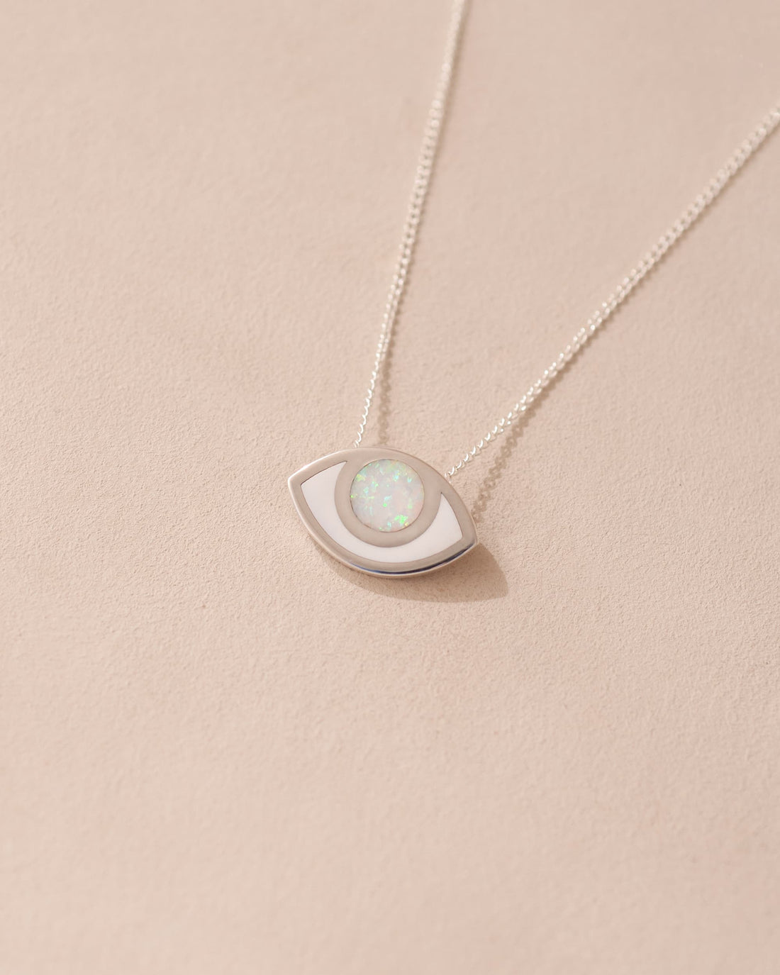 silver eye pendant inlaid with opal with silver chain